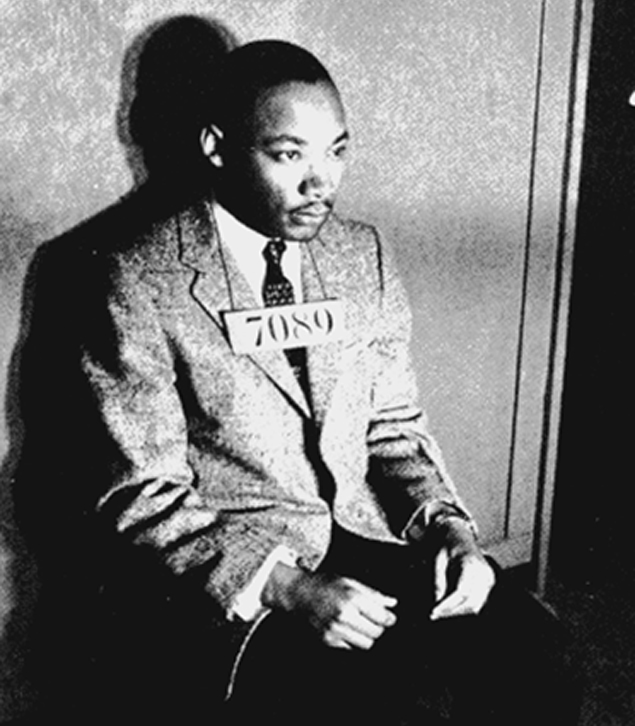 Martin Luther King, Jr., prisoner #7089, has his mug shot taken by police after he was arrested during the Montgomery bus boycott. Photo by Marion S. Trikosko, U.S. News & World Report Magazine