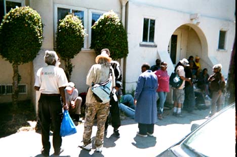 “Coming Together to Eat.” People line up to eat at a church in Berkeley. "Churches have been helping poor people for a long time. They provide nutritional food which enables people to live and have hope.”  Vernon Andrews photo