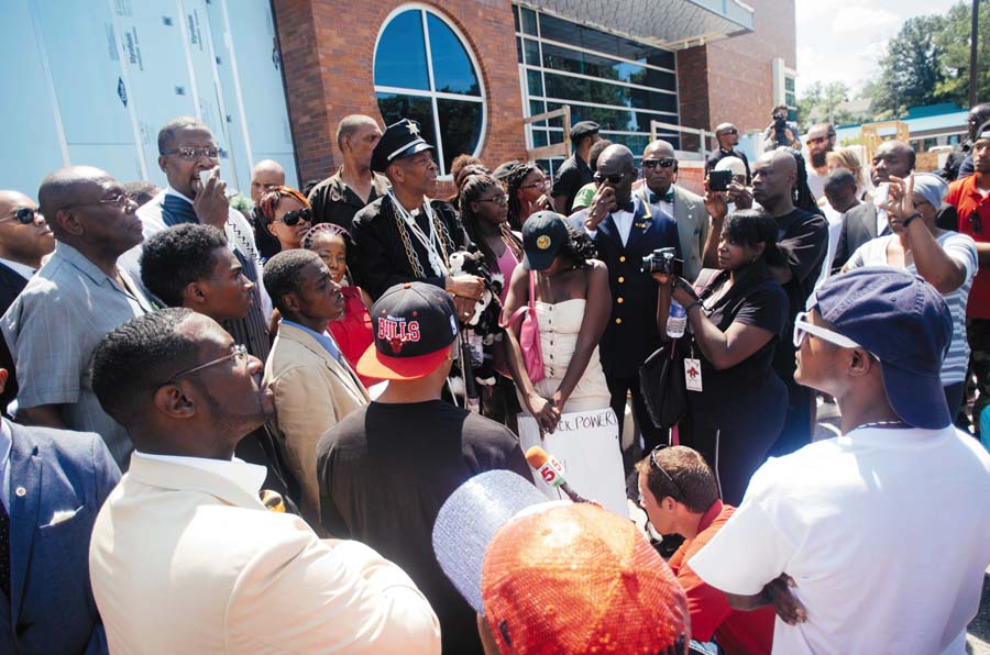 Protesters gathered at the Ferguson Police Department after Michael Brown was killed on August 9, 2014. In December 2014, the Berkeley police violently attacked demonstrators who were protesting this police killing. Photo credit: Jamelle Bouie