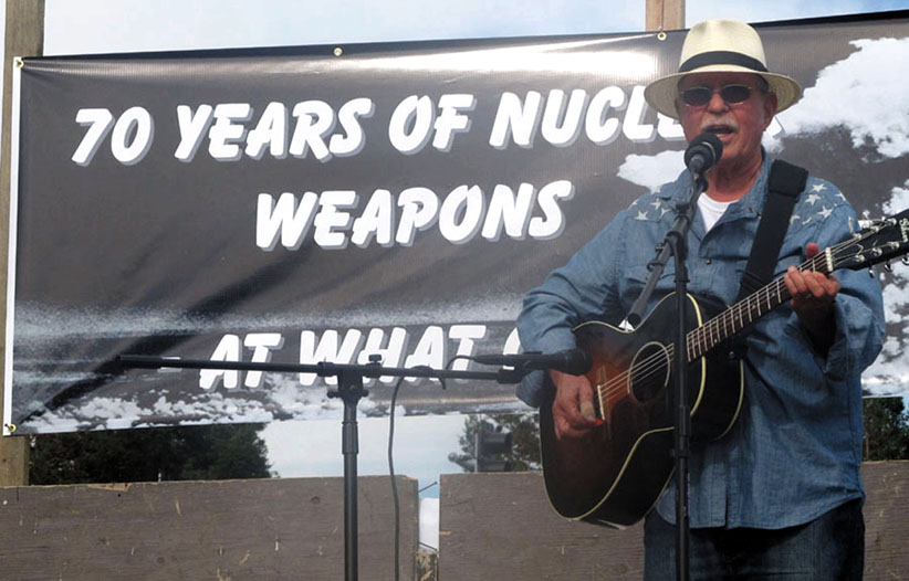Country Joe McDonald performed anti-war songs at Livermore Lab on Hiroshima Day, August 6, 2015, on the 70th anniversary of the atomic bombing of Hiroshima.