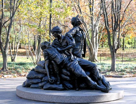 The Vietnam Women's Memorial in Washington, D.C., is dedicated to the women who served in the Vietnam War, most of whom were nurses. It depicts three uniformed women with a wounded soldier. It was designed by Glenna Goodacre.