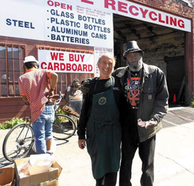 Darrell Hopkins, retiring from years of recycling, and Joe Liesner, a Food Not Bombs member who brings food to the recyclers, have become good friends. Lydia Gans photo