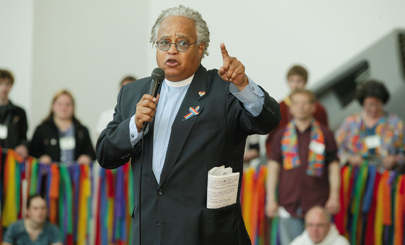 The Rev. Phil Lawson rallies supporters of full rights for gays and lesbians in the United Methodist Church. Rev. Lawson, the retired pastor of Easter Hill United Methodist Church, dedicated his entire life to working for justice. Photo by Mike DuBose.