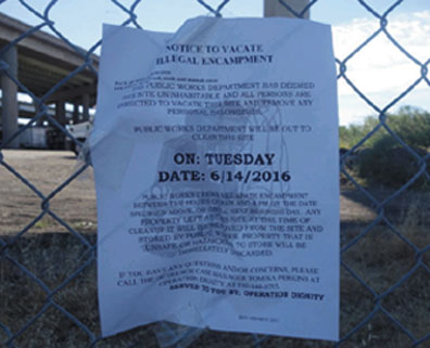 Oakland officials posted this note to vacate the encampment and used the term "abatement" to describe their attempt to discard human beings.