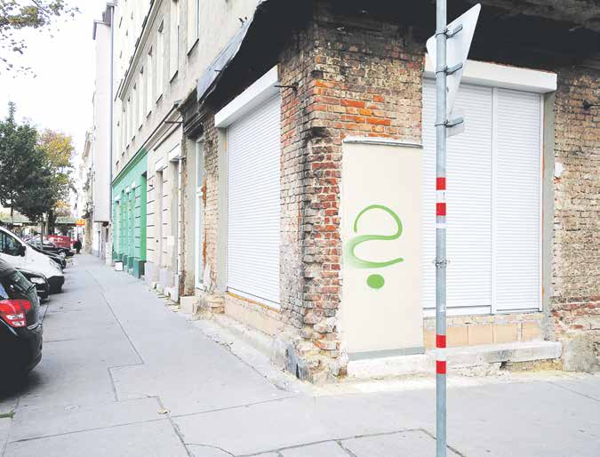 Brunner Strasse—a street in Vienna where sex workers often work. Someone stray painted a green question mark onto the wall.