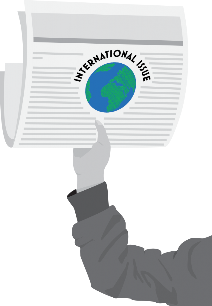 A digital image of a person's arm holding up a newspaper. The text is not read-able, except in the middle there is a logo of a globe with the words "international issue" over the top.