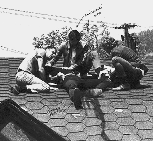 James Rector lays on a rooftop after he is shot.