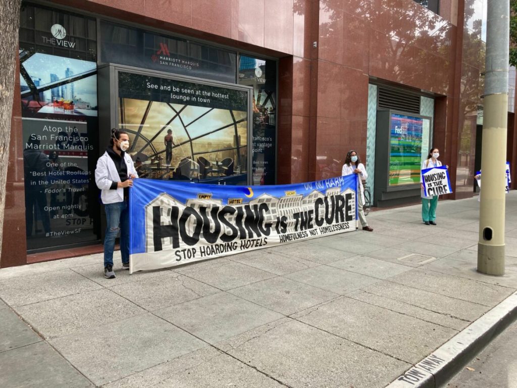 Protesters from POOR magazine attempt to occupy the Marriott Marquis hotel in May, demand the city house more homeless residents in vacant hotel rooms.