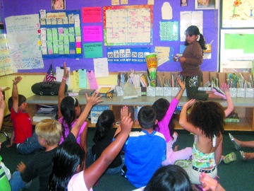 Students eager to learn in an inner-city Oakland classroom. Margot Pepper photo