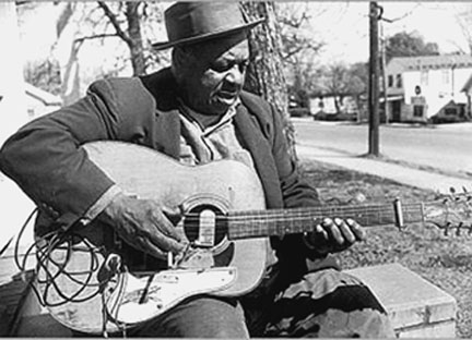 Big Joe Williams plays the unique nine-string guitar that he invented to give his blues a distinctive sound. Big Joe wrote a profoundly moving tribute to Martin Luther King.