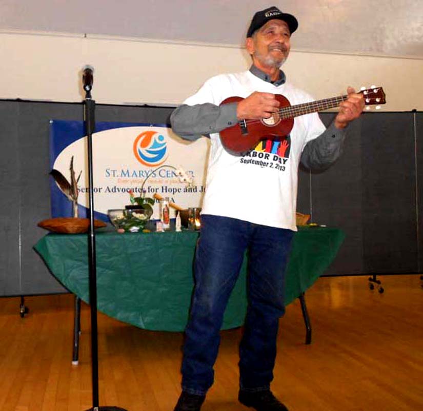 Frances Estrella described the great impact Dave Ferguson had on his life. He played his ukelele and sang, “We Shall Gather by the River.” Lydia Gans photo
