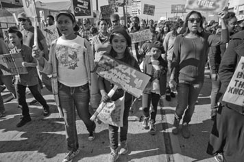 Children in a march celebrating the birthday of Rev. Martin Luther King Jr.