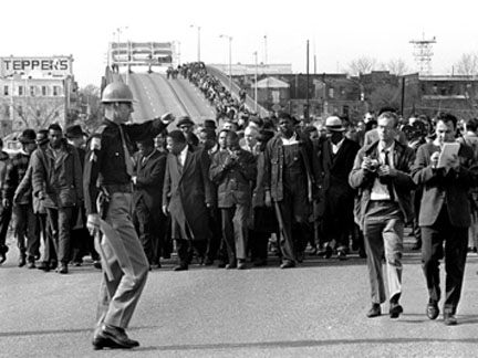 Selmapolice.jpg Police in Selma, Alabama, wait for civil rights marchers as they cross the Edmund Pettus Bridge.