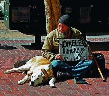 A homeless man and his dog ask for food in San Francisco. Robert L. Terrell photo 