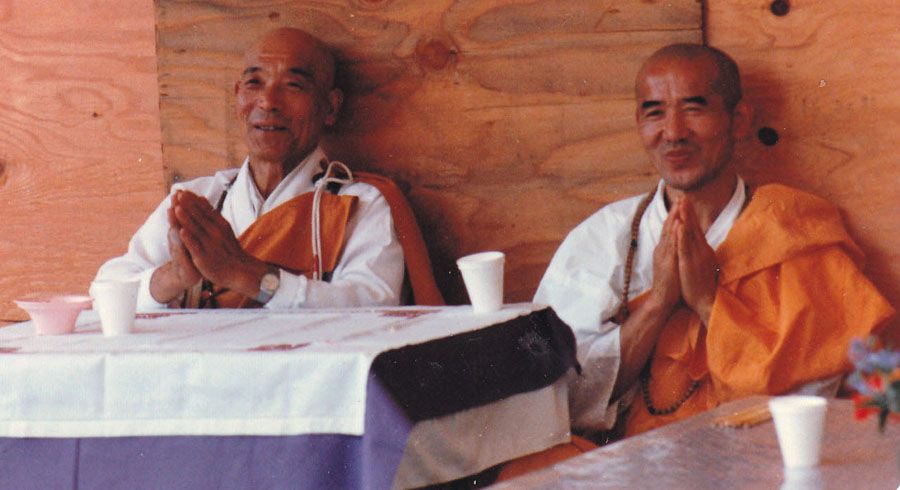 Two Buddhist  monks of the Nipponzan Myohoji order pray for peace inside the geodesic done at Ground zero.