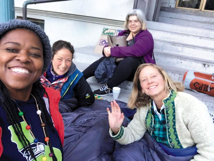 Four women who played inspiring roles in organizing a vigil and sleep-out at City Hall. From left to right, Moni Law, Genevieve Wilson, Elisa Cooper and Sally Hindman.