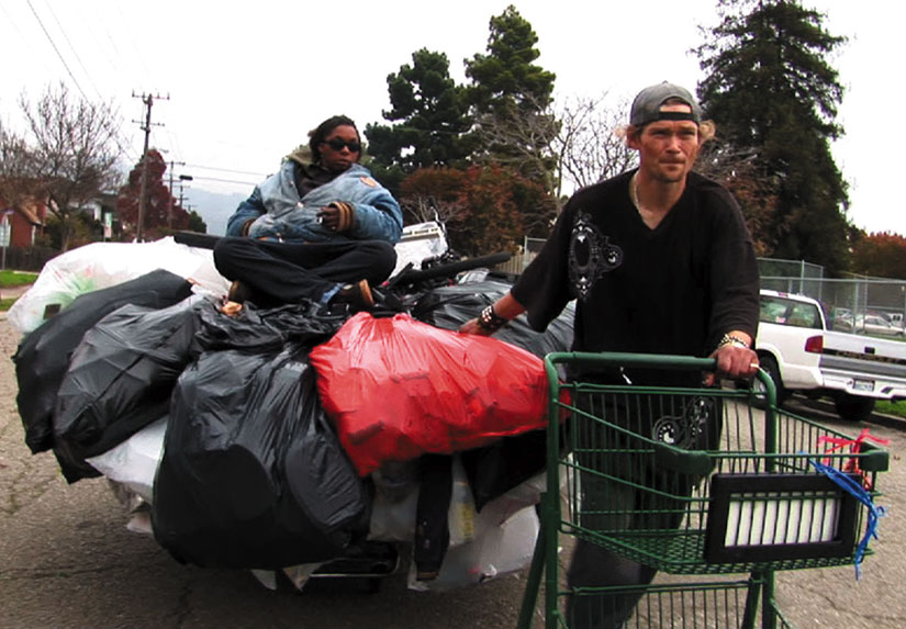 Jason Witt and Heather Holloway carry massive amounts of recycled materials to Oakland centers every day.