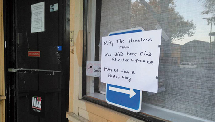 A sign posted nearby had poignant words: “May the homeless man who died here find shelter and peace. May we find a better way.” Daniel McMullan photo