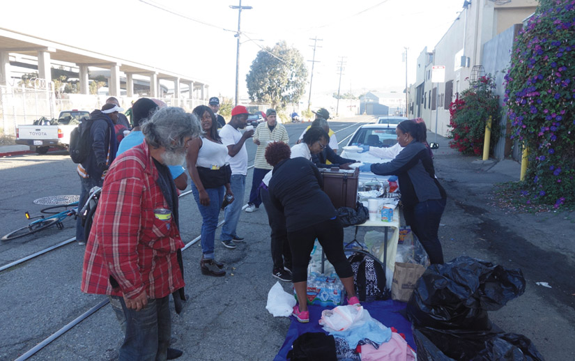 While some Oakland residents are bringing meals and needed supplies to their homeless neighbors, other affluent residents are asking city officials and the police to dismantle and evict homeless encampments. Kwalin Kimaathi photo