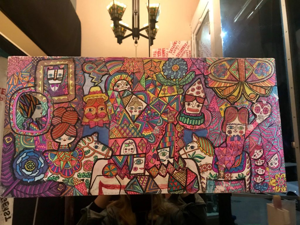 A colorful drawing by Dano, one of the artists featured in the exhibit.