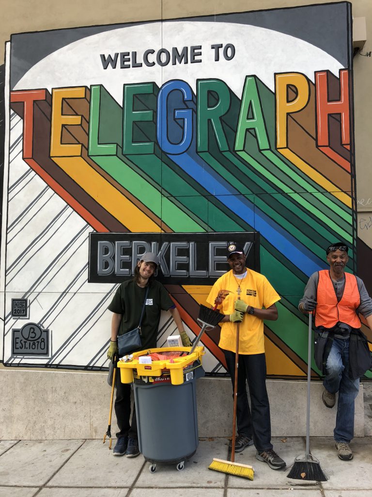 DST team members Leona, Moe, and Gary, pose for a photo in Berkeley. 