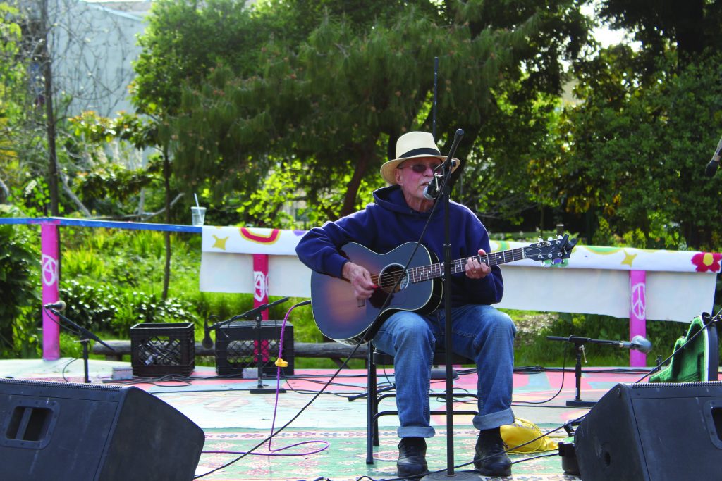 Country Joe MacDonald plays a set on the People’s Park stage.