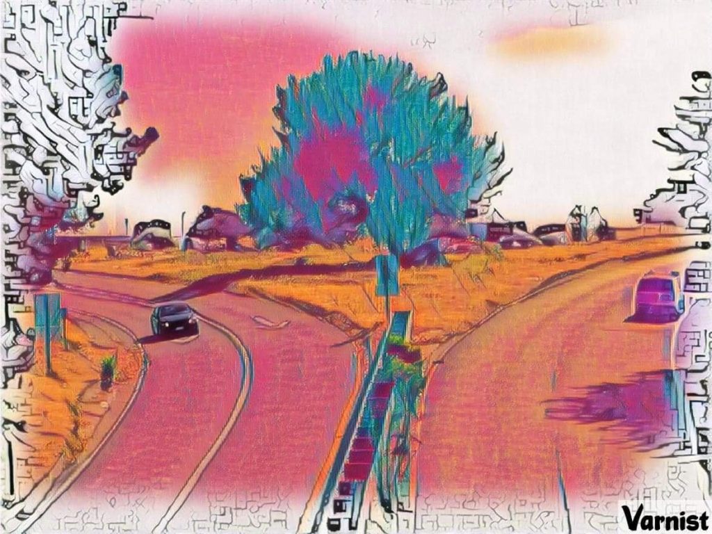 A photograph of the Ashby/Shellmound offramp that has with a filter on it that makes the colors in the photo shades of bright pink, orange, purple, and blue.